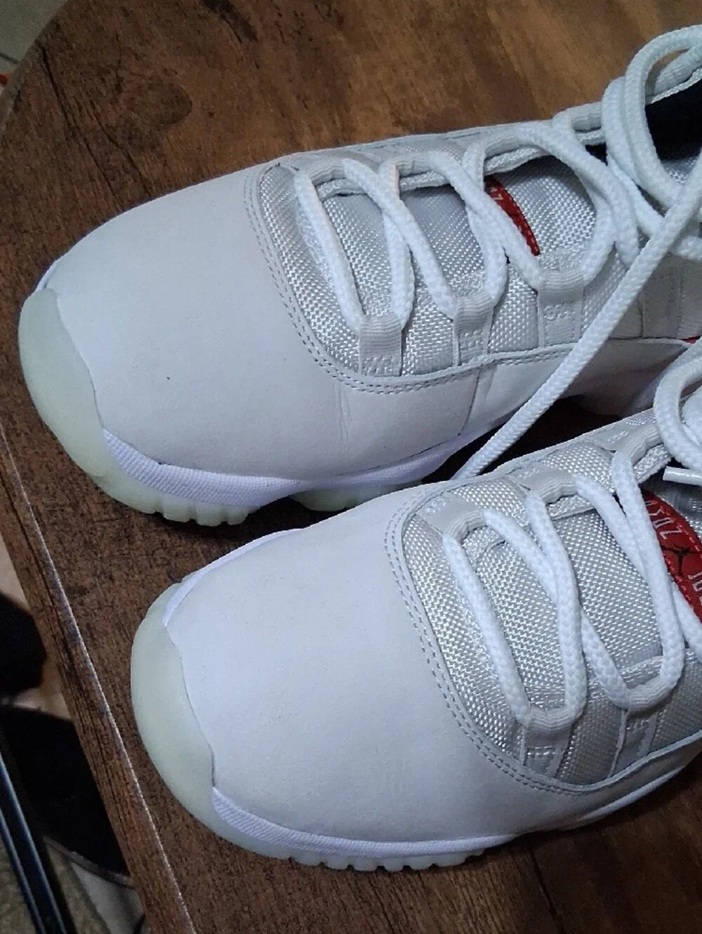 Jordan Men’s High-Top Sneakers in White with Red Accents